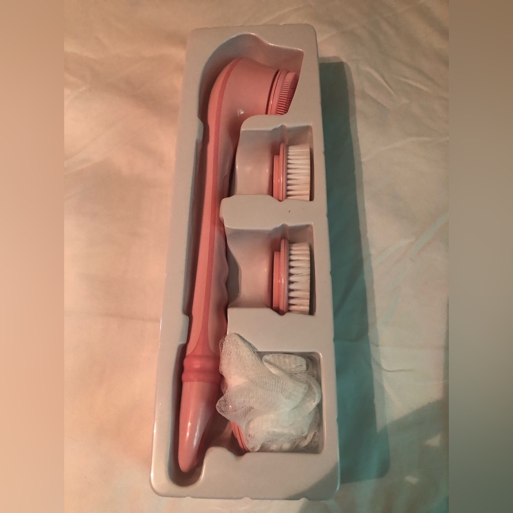 Blushy exfoliating rechargeable brush set. Brand new